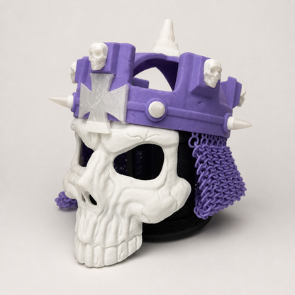 Three-quarter left-side studio view of the purple-and-white 3D printed WWE Skull King Crown with sculpted skull mask, side spikes, and chainmail-style drape.