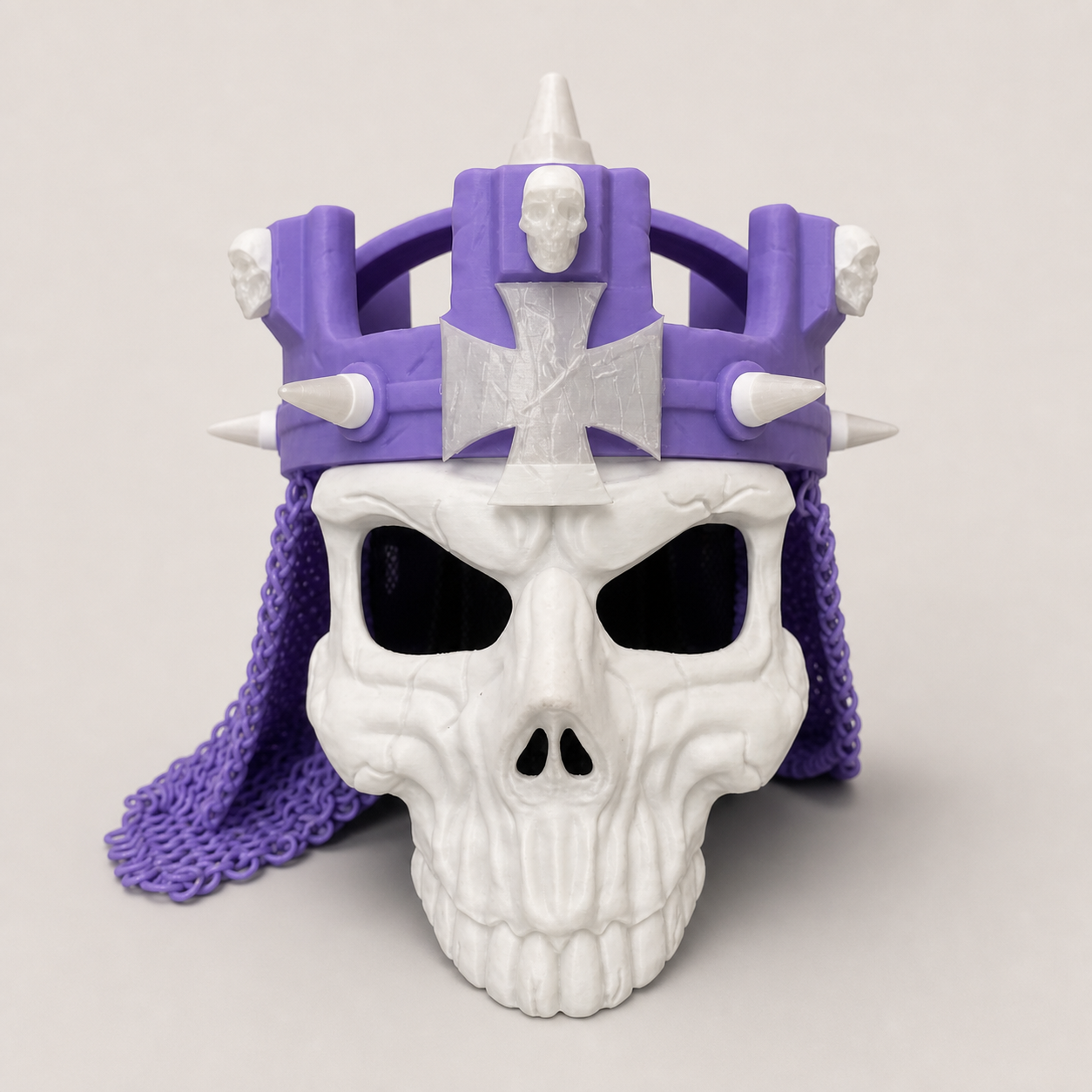 Studio front view of the purple-and-white 3D printed WWE Skull King Crown with skull mask and chainmail-style drape.