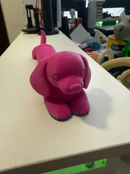 Articulated 3D printed slinky dog, pink