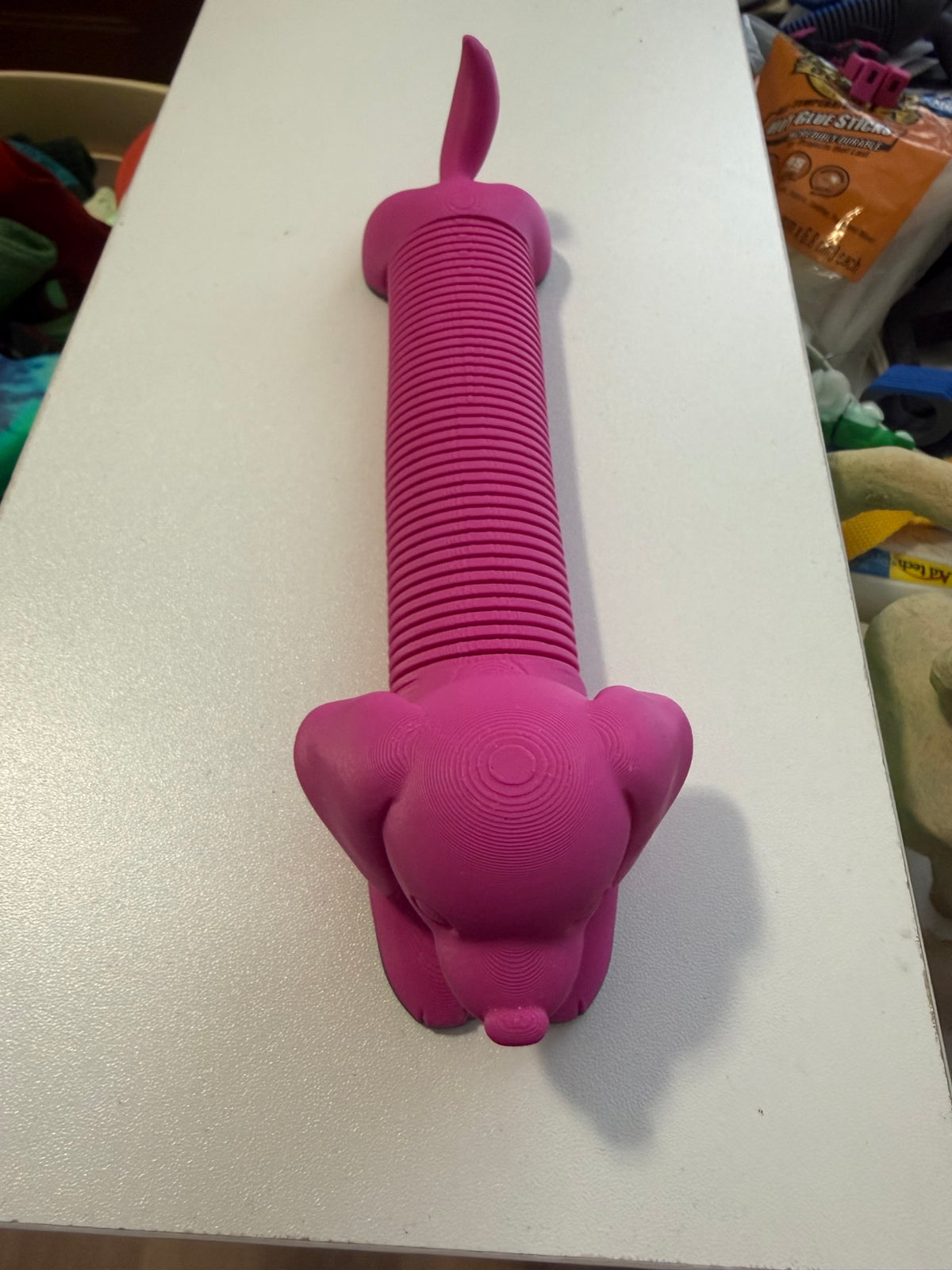 Articulated 3D printed slinky dog stretched out
